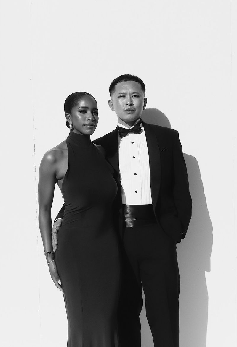 Live Portrait: a couple in a black halter gown and tuxedo